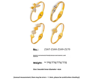 Detailed view of four titanium steel gold bracelets featuring butterflies and clover designs