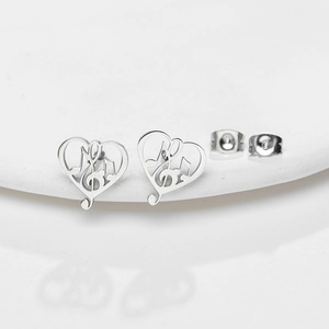 Minimalist silver heart and musical note stud earrings in polished stainless steel