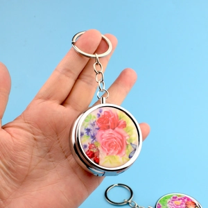 Portable metal pill box keychain with vintage red rose and purple floral pattern