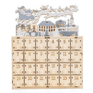 Detailed close-up of 24 wooden countdown drawers and festive Santa carvings with silver glitter