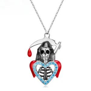 Detail of S925 silver gothic necklace with grim reaper holding a red heart pendant