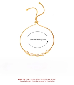 Detail of adjustable gold bracelet with oval zircon stones and size specifications