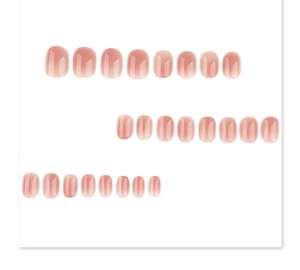 Detail view of 24 pieces short oval press-on nails with natural pink ombre jelly finish