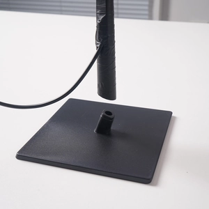 Close-up of the stable black square base and USB cable for the birch fiber optic tree lamp