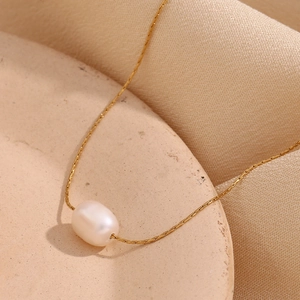 Minimalist 18K gold plated stainless steel necklace with a single oval white pearl pendant