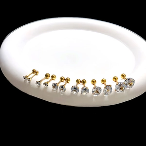 Set of six gold plated titanium steel stud earrings with cubic zirconia in various sizes