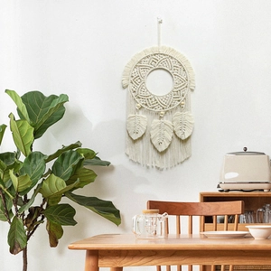 Bohemian handmade macrame wall hanging with woven feather tassels for home decor