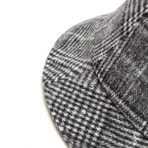 Macro detail of the vintage plaid wool fabric texture and thick woven patterns