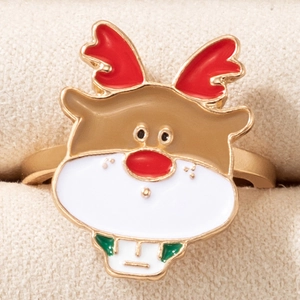 Close-up of festive Christmas reindeer alloy ring with colorful enamel inlay in a gift box