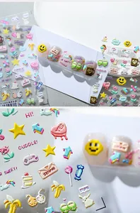 Detailed macro view of 3D embossed pixel art nail stickers with cute cartoon heart icons