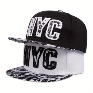 Detailed view of NYC embroidery and graffiti print on street style snapback hats