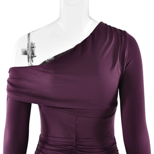 Detail of purple off-shoulder dress with elegant pleated fabric and draped sleeve design