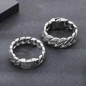 Detailed macro shot of 316L stainless steel thick Cuban chain bracelets for men and women