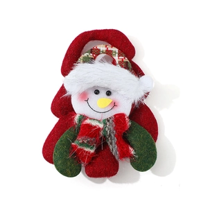Plush Christmas snowman ornament with festive red and green hat for holiday tree decoration