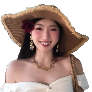 Vintage palace style hollow flower necklace and earring set with a large brown straw hat