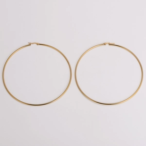 Classic 100mm gold stainless steel hoop earrings for women with a polished finish