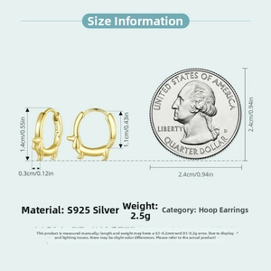 Detail view of gold dachshund earrings with size measurements and coin for scale