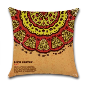Detailed macro view of ethnic mandala pattern on linen pillowcase with red floral design