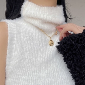 Vintage gold S925 sterling silver queen coin pendant necklace worn on a high collar