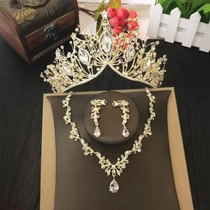 Detailed set of gold-plated bridal crown, necklace and drop earrings with clear crystals