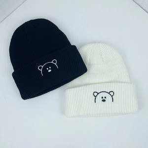 Kids warm knit beanies with cute bear embroidery in black and creamy white
