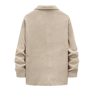 Detail of heavyweight beige knit shirt jacket back with visible twill texture