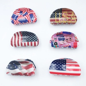 Set of 6 PVC hair claws featuring American and British flag designs with USA text