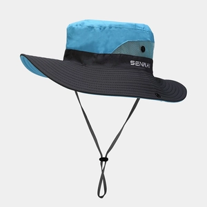 Detail of blue outdoor sun hat featuring breathable mesh panels and adjustable chin strap