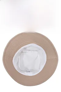 Detailed view of khaki sun hat interior with breathable lining and care label
