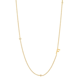 Detailed top view of 18K gold plated necklace with letter F pendant and crystal gems