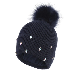 Navy blue knitted beanie with plush pompom and rhinestone embellishments for winter