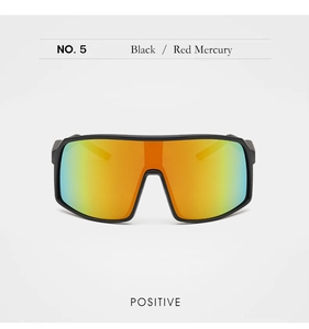 Macro view of black framed cycling sunglasses with orange-red mercury gradient lenses