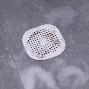 White silicone hair catcher drain cover for bathroom with round drainage holes