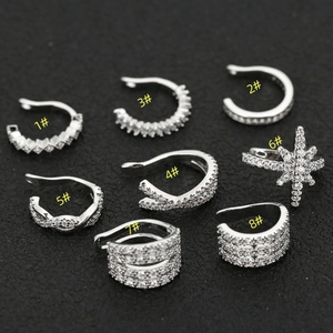 Set of 8 silver non-piercing ear cuffs with sparkling cubic zirconia in various designs