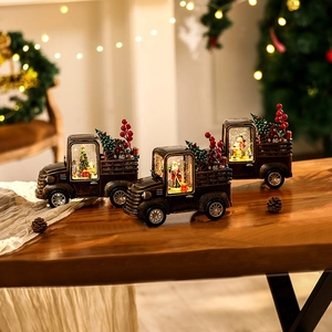 Retro Christmas pickup truck music box with glowing snow globe and Santa Claus scene