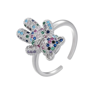 Detailed view of silver bow-knot bear ring with vibrant multi-colored crystal stones