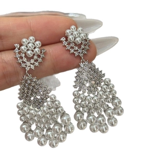 Silver needle earrings with teardrop diamonds, pearls and tassel in palace style