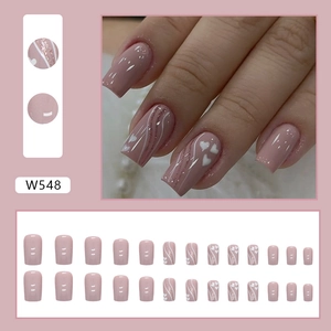 Pink press-on nails with white heart and wavy patterns, including 24 assorted sizes