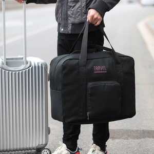Large capacity black nylon travel bag with trolley sleeve and purple travel print on exterior