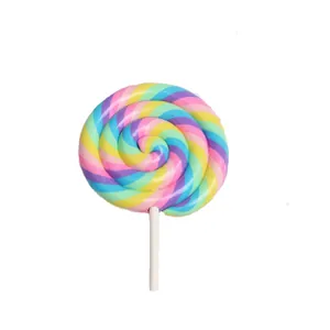 Large colorful polymer clay lollipop pendant with spiral rainbow swirl and white stick