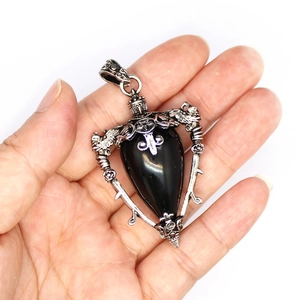 Gothic silver teardrop labradorite crystal pendant with winged dragon and star details