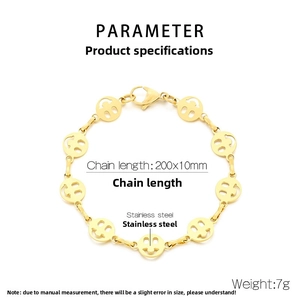 Detail of gold hollow smiley face link bracelet in stainless steel with size specs