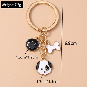 Detailed view of dog keychain dimensions including weight 7.3g and pendant sizes