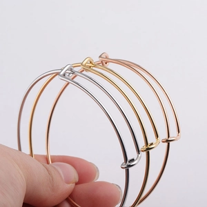 Three-color adjustable stainless steel wire bangles in silver, gold, and rose gold finish