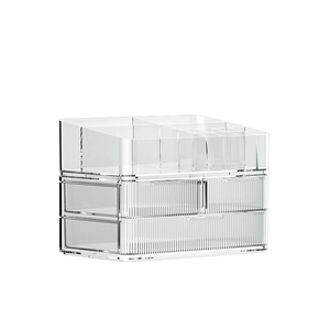 Clear acrylic makeup organizer with multi-tier drawers and top racks for vanity storage