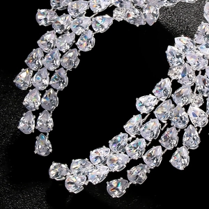 Elegant wing-shaped stud earrings with sparkling pear-cut cubic zirconia in silver finish