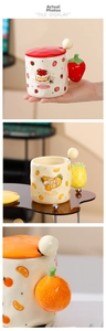 Detailed tile display of cute fruit ceramic mugs with matching lids and spoons