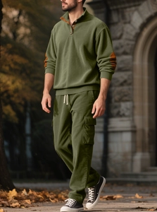 Detail of military green corduroy tracksuit with elbow patches and cargo pants