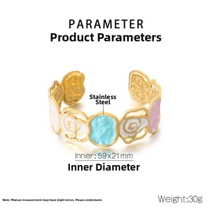Polished gold stainless steel bangle featuring floral enamel details and 59x21mm dimensions