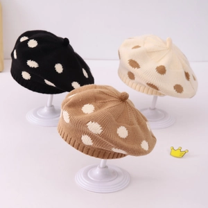 Three autumn knit polka dot beret hats for girls in black, beige, and light brown colors